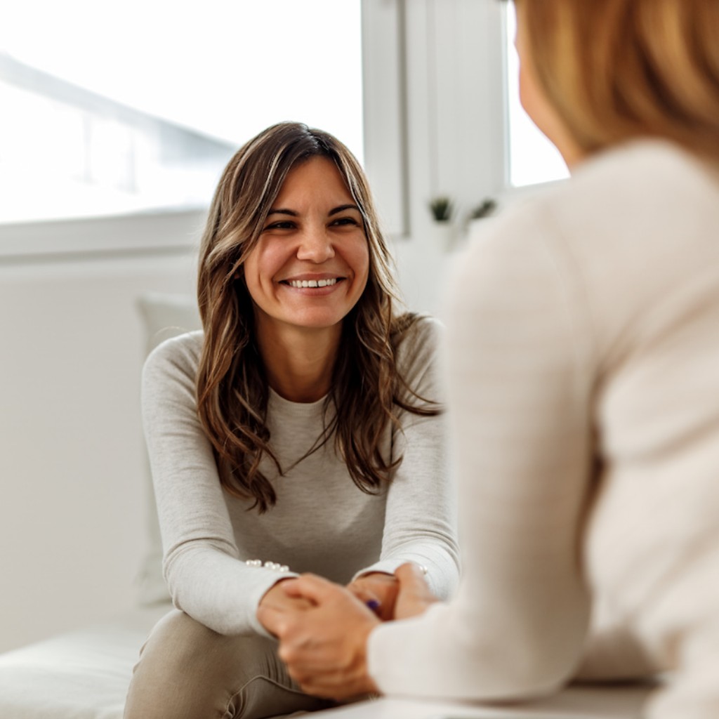 Clinician and patient in a supportive mental health consultation